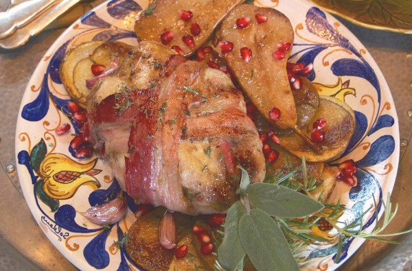Roast partridge, pomegranate, olives and anchovy butter cooked in a Harrison Oven